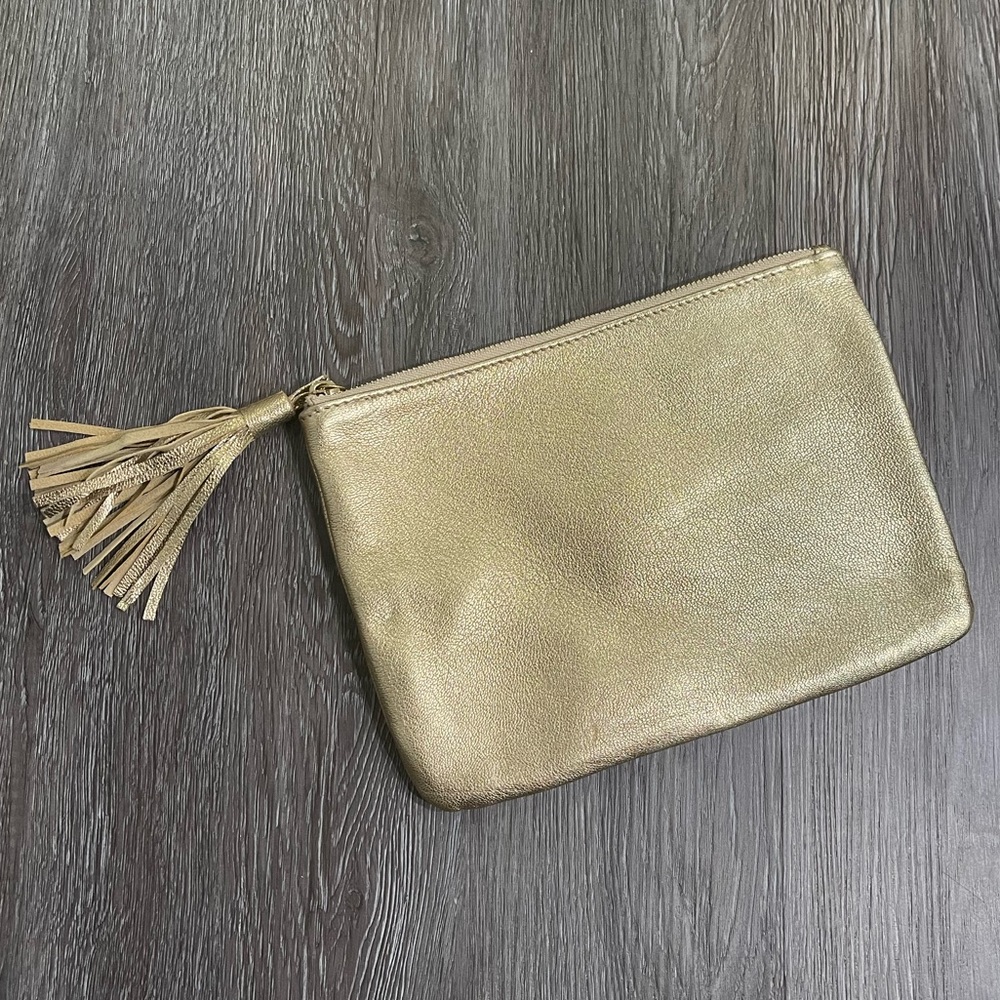 Trina Turk metallic gold clutch